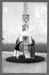 Suffrage campaign days in New Jersey (women putting up banner)