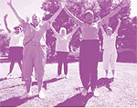Photo of women exercising together in a park