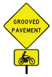 Image of a roadway sign alerting motorcycle riders to grooved pavement ahead.