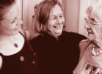 Image of three women laughing