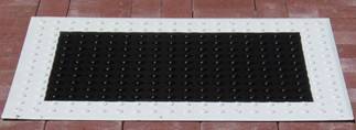 Figure 3. Photo. Black-and-White Patterned Detectable Warnings. This figure shows each of the three black-and-white patterned detectable warnings used in this study. The first has a black center and a white border, the second has longitudinal black and white stripes, and the third has a white center and a black border. The name of each detectable warning is presented to the left of its photo.