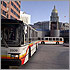 Thumbnail photo of a bus in front of the Colorado Capitol Building.