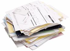Photograph of medical bills and receipts
