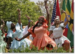 Members from the Kankouran West African Dance Company performs during a ceremony marking Malaria Awareness Day Wednesday, April 25, 2007, in the Rose Garden.  White House photo by Eric Draper