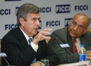 Secretary Johanns delivers keynote address regarding U.S. agricultural trade with India to the Federation of Chambers of Commerce and Industry (FICCI) during his November 2006 visit to India as FICCI President Saroj K. Poddar looks on.