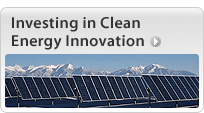 An image that says 'Investing in Clean Energy Innovation' featuring a photo of rows of solar panels with mountain peaks behind them.