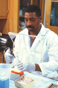 Photograph of worker in a laboratory