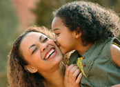 foster mother and girl laughing