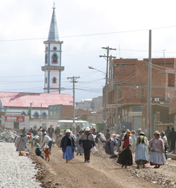 Public infrastructure projects in Bolivia, like this road under construction in El Alto, a town just north of La Paz, are awarded to local firms thanks to inverse trade fairs.