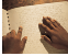 Braille reading image.