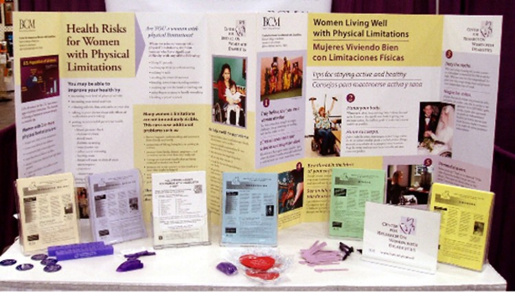 a display of CROWD's health promotion posters and newsletters in English and Spanish 
