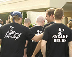 Photo of Team members with Team T-shirt.