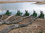photo: Pumps used to lower water level in reservoir