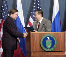 Secretary Abraham welcomes Russian Ambassador to the United States Yuri Ushakov to the press conference.