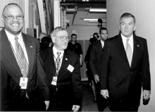Marvin Gunn, DOE Chicago Operations Office Manager, and Hermann Grunder, ANL Director, accompany Secretary of Homeland Security Tom Ridge during the TopOff 2 exercise.