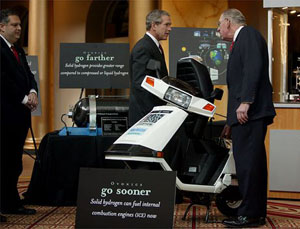 President Bush, Secretary Abraham, and Environmental Protection Agency Administrator Christine Todd Whitman tour hydrogen fuel cell technologies on display at the National Building Museum