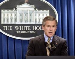 President George W. Bush makes a statement to the press Libya plans to disclose and dismantle all weapons of mass destruction programs