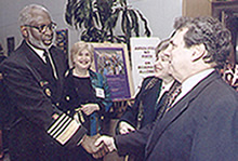 Photo of Dr. David Satcher, Reva Lawrence, Dr. Ruth Kirschstein, and Dr. Stephen Katz