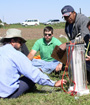 Photo of soil scientists being trained in the field.