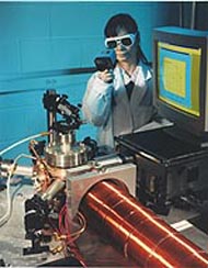 A researcher aligns ATTA's optics