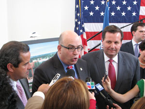 Director Gonzalez, Mayor Manny Diaz and Mayor Julio Robaina are interviewed by the press at the Freedom Tower event