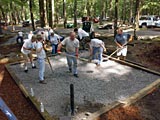Volunteers prepare sites for new picnic tables and grills as part of Y‑12 Help to the Smokies.