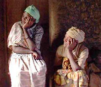 two women sitting in rwanda