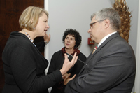 Photo of Education Secretary Margaret Spellings speaking with Luiz Loureiro, Executive Director of the Commission for Educational Exchange between the United States of America and Brazil (Fulbright Commission in Brazil), and Fulvia Rosenberg of the Carlos Chagas Foundation, which partners with the Ford International Scholarship Program - Fulbright partnership for disadvantaged students.