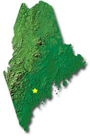 Image of Maine with a star pinpointing the location of the capital.