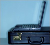 Laptop and briefcase