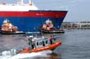 USCG boat provides security for LNG tanker in harbor