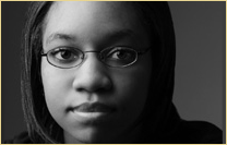 Michelle McMillan, a young African American woman wearing glasses