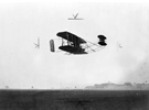 Orville Wright in a demonstration flight over Tempelhof Field in Berlin, 1909.
