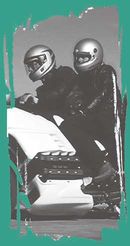 Image of two people on a motorcycle