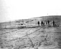 Readying the Flyer for its first flight on December 14, 1903. 