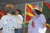 Peace Corps staff explain to the participants the details of various world flags, which the youth then reproduced with construction paper and materials.