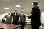 Board Chair Stephen Goldsmith administers the oath of office to the Corporation's newest board members - Rick Hill, Jim Palmer, and Stan Soloway (L-R).  On September 19, 2007, the Corporation for National and Community Service welcomed three new members to it's Board of Directors.  The members, nominated by President, were confirmed by the Senate last June. 