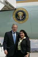 President George W. Bush presented the President’s Volunteer Service Award to Patricia Ortiz, 20, upon arrival at Kirtland Air Force Base in Albuquerque, New Mexico, on Friday, June 16, 2006.  Ortiz is a volunteer with Youth Service America.  To thank them for making a difference in the lives of others, President Bush honors local volunteers, called USA Freedom Corps greeters, when he travels throughout the United States.  President Bush has met with more than 500 individuals around the country, like Ortiz, since March 2002.