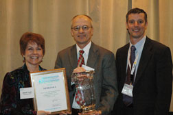 Nebraska State Conservationist Steve Chick (center) receives National Earth Team Volunteer Service Award from Associate Chief Dana York and Legislative and Public Affairs Director Doug McKalip. NRCS image.