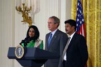 President George W. Bush presented the President’s Volunteer Service Award to Dayalan Sanders and Diyana Sanders in a ceremony in the East Room of the White House on May 26, 2005. The ceremony, part of a White House celebration of Asian Pacific American Heritage Month, was also attended by President Yudhoyono of Indonesia.