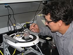 photo of James Kushmerick with nanoswitch apparatus