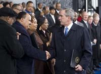 President George W. Bush greets Martin Luther King III and his sisters, Yolanda Denise King and Bernice Albertine King, Monday, Nov. 13, 2006, following President Bush’s speech at the groundbreaking ceremony for the Martin Luther King Jr. National Memorial on the National Mall in Washington, D.C.