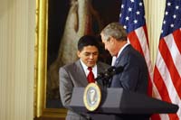 President George W. Bush presented the President’s Volunteer Service Award to Manuel Fonseca of Nashville, Tennessee in a ceremony in the East Room of the White House on October 7, 2005. The ceremony, part of a White House celebration of Hispanic Heritage Month, was also attended by Attorney General Alberto Gonzales and Secretary of Commerce Carlos Gutierrez.