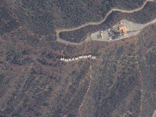 A seamless zoom from space to the ground, using data from Terra-MODIS, Landsat-ETM+, and IKONOS, and ending at the Hollywood Sign in Los Angeles, California.