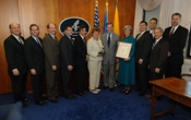 HHS Secretary Mike Leavitt presents the Presidential Award for Management Excellence. Pictured are (from left): Counselor to the Secretary for Human Services Policy Richard Campanelli, HHS Deputy Secretary Alex Azar, Assistant Secretary for Children and Families Wade F. Horn, Office of Public Health and Science’s Brad Hendrick, ACF’s David Jenkins, ACF’s Diana King, Secretary Leavitt, ACF’s Deborah Ferrenz, Director of the Office of Information Services Michael Curtis, HHS Chief Information Officer Charlie Havokost, Deputy Assistant Secretary for Administration Curt Coy and Deputy Chief of Staff Kerry Weems. [Credit Chris Smith]