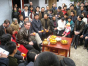 Secretary Leavitt meets with villagers in Yujian Village, Sichuan.