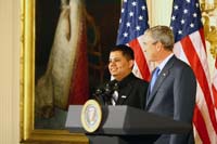 President George W. Bush presented the President’s Volunteer Service Award to Eleuterio “Junior” Salazar of Bradenton, Florida in a ceremony in the East Room of the White House on October 7, 2005.