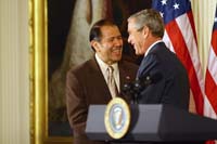 President George W. Bush presented the President’s Volunteer Service Award to Dr. Elmer Carreno of Silver Spring, Maryland in a ceremony in the East Room of the White House on October 7, 2005.