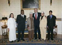 On May 12, 2006, President George W. Bush presented the President’s Volunteer Service Award to five outstanding individuals during a ceremony marking Asian Pacific American Heritage Month in the East Room of the White House. 