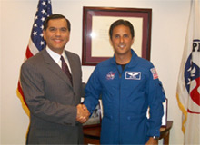 Peace Corps Director Gaddi H. Vasquez congratulates Joe Acaba on becoming the first former Peace Corps Volunteer to become a U.S. astronaut.
